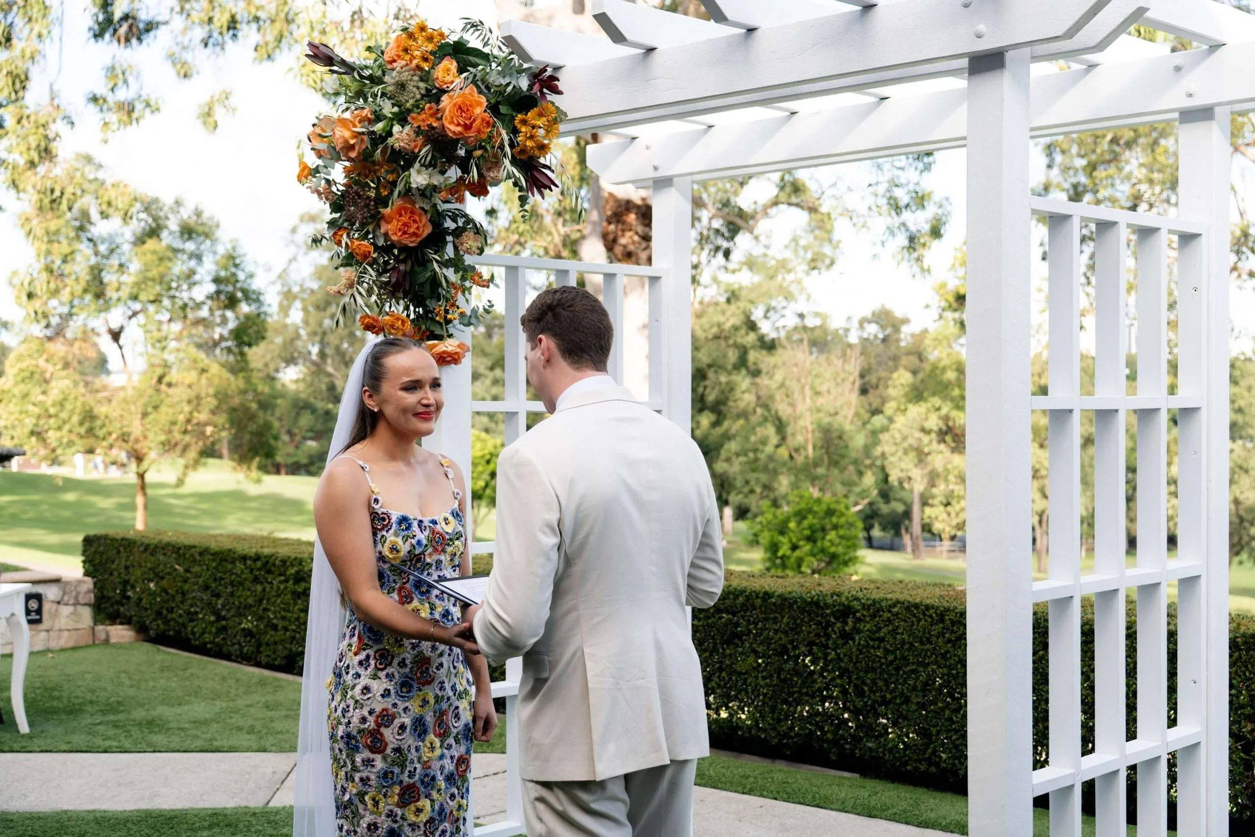 bride Charlotte look at groom almost cry while he making his vows