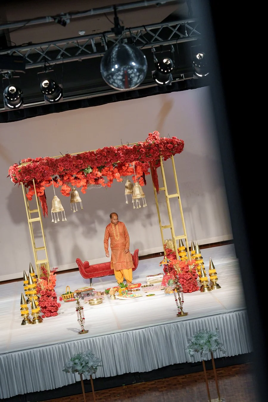 the priest walk around the stage