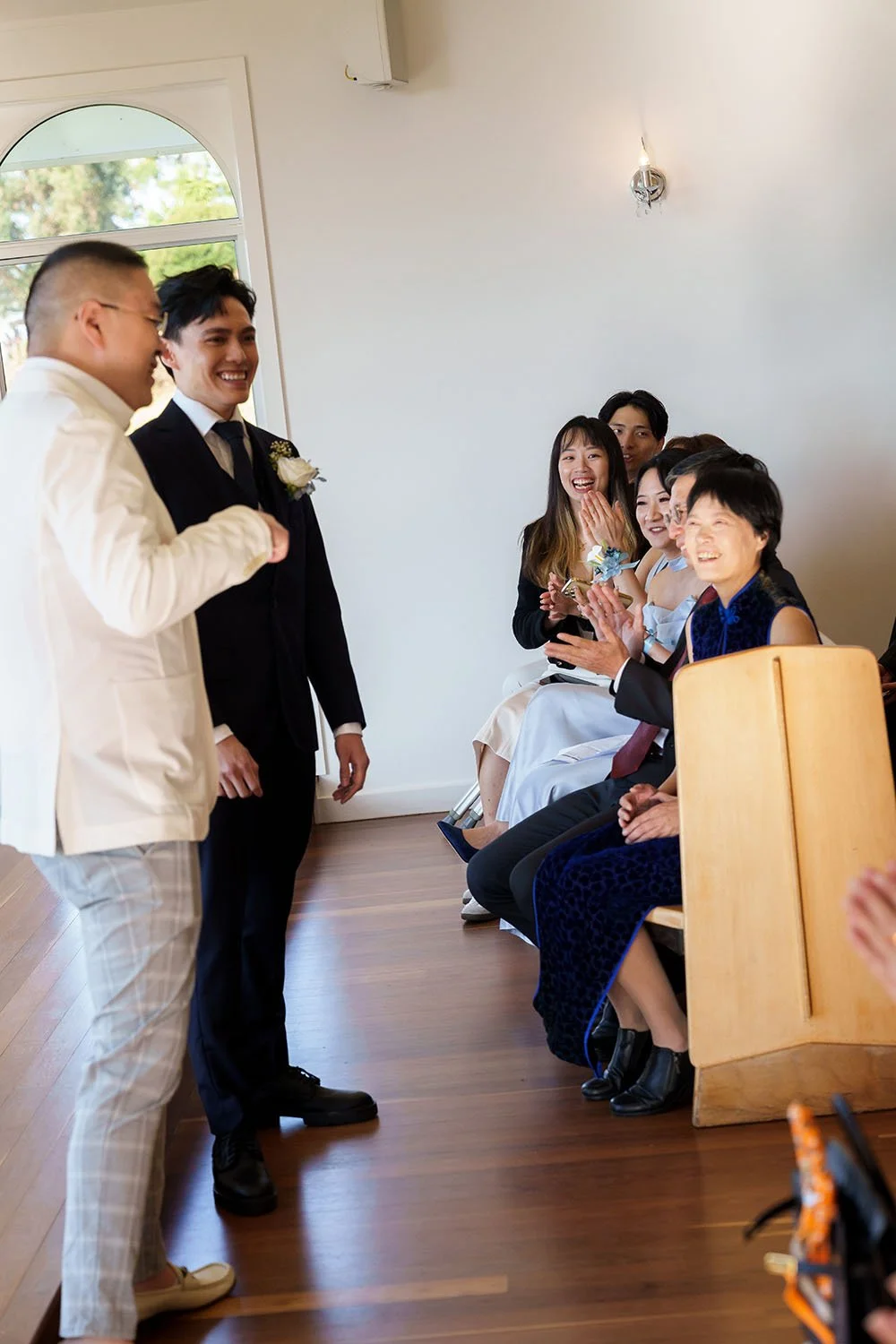 celebrant making Michael laughing and relax before ceremony