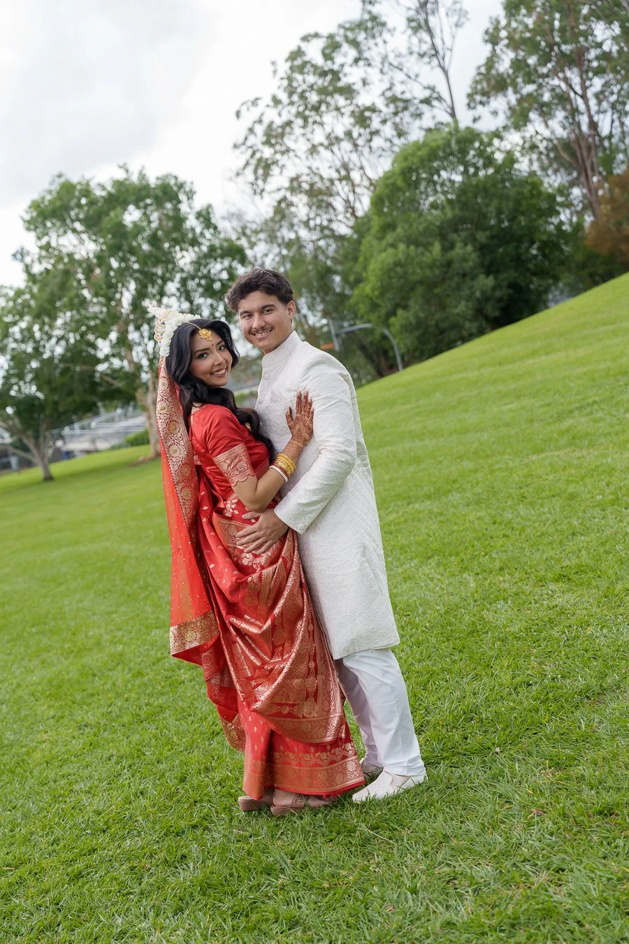 Amrita and Casey holding each other