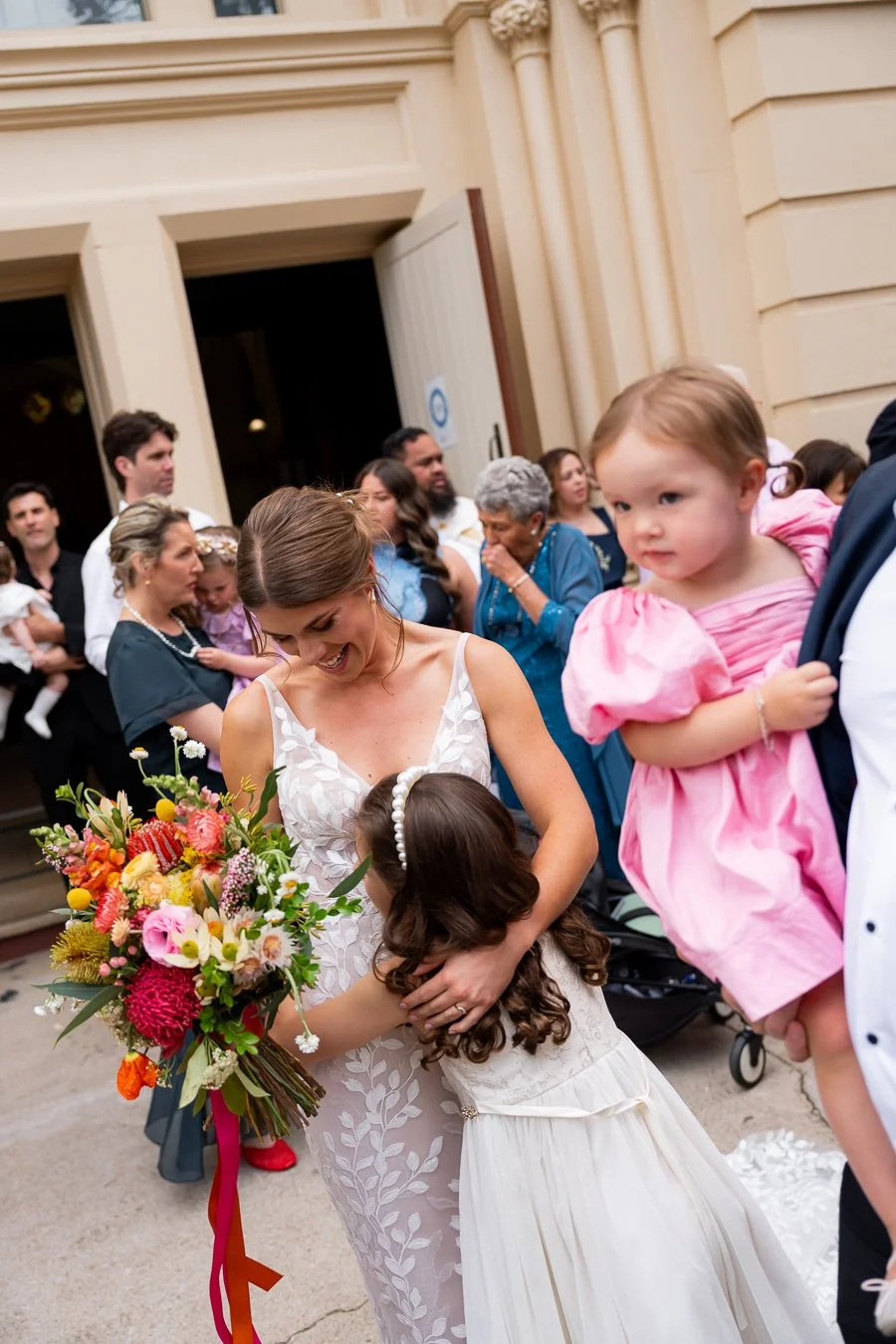 a girl hugging bride Sonya