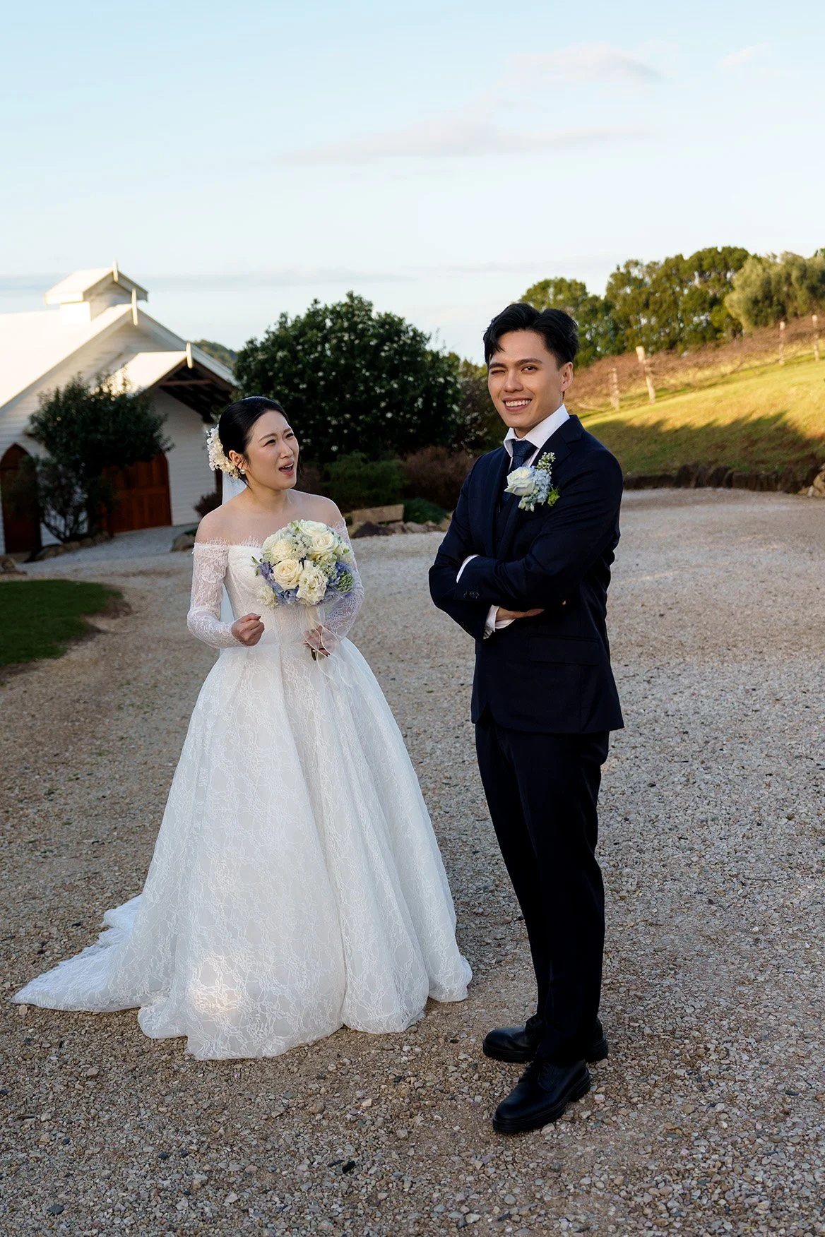Michael with one eye close look to the wedding photographer Whistler Li, and Lisa screening to him 