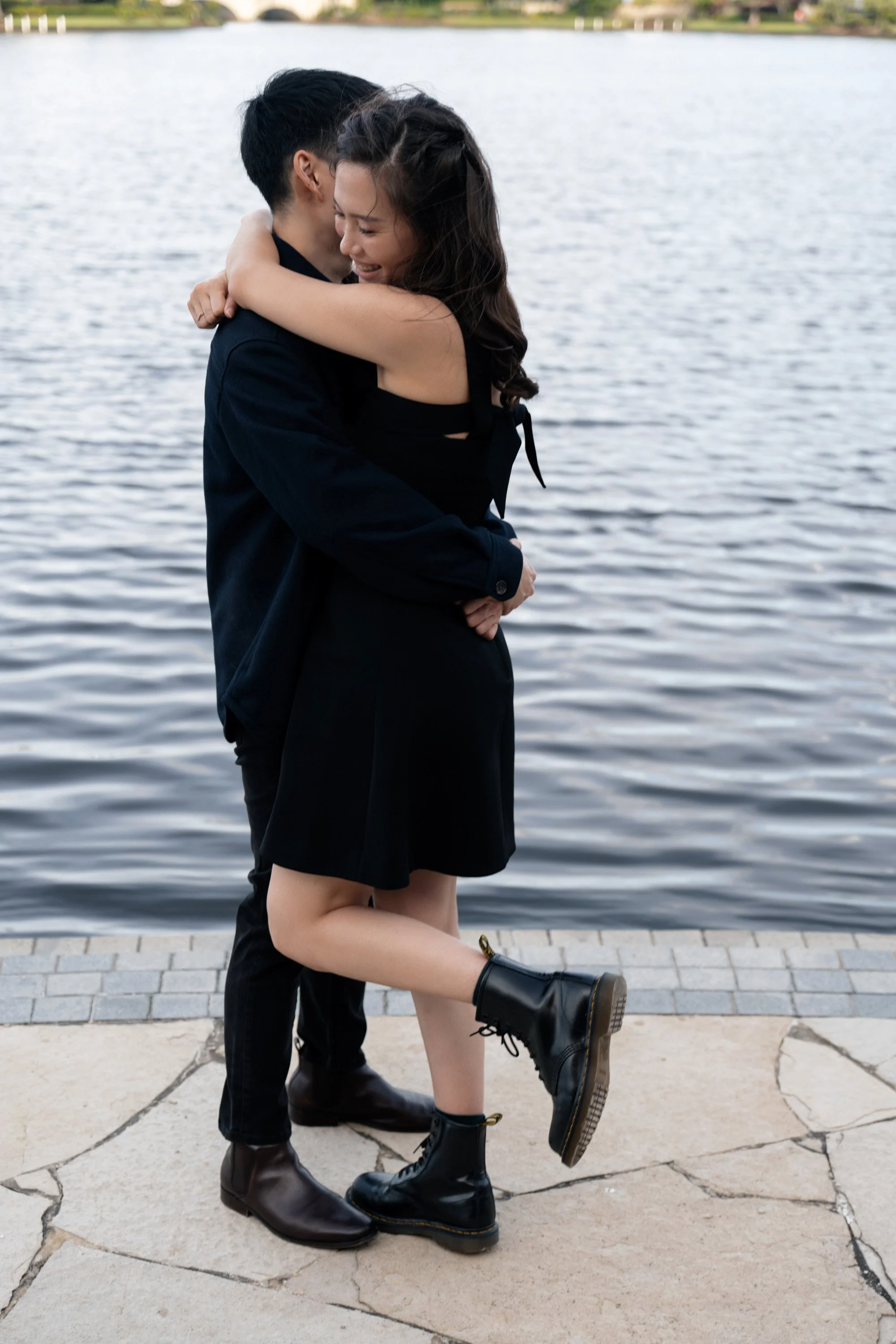 Krystel hugging Paul and they both laughs in Emerald Lakes Village