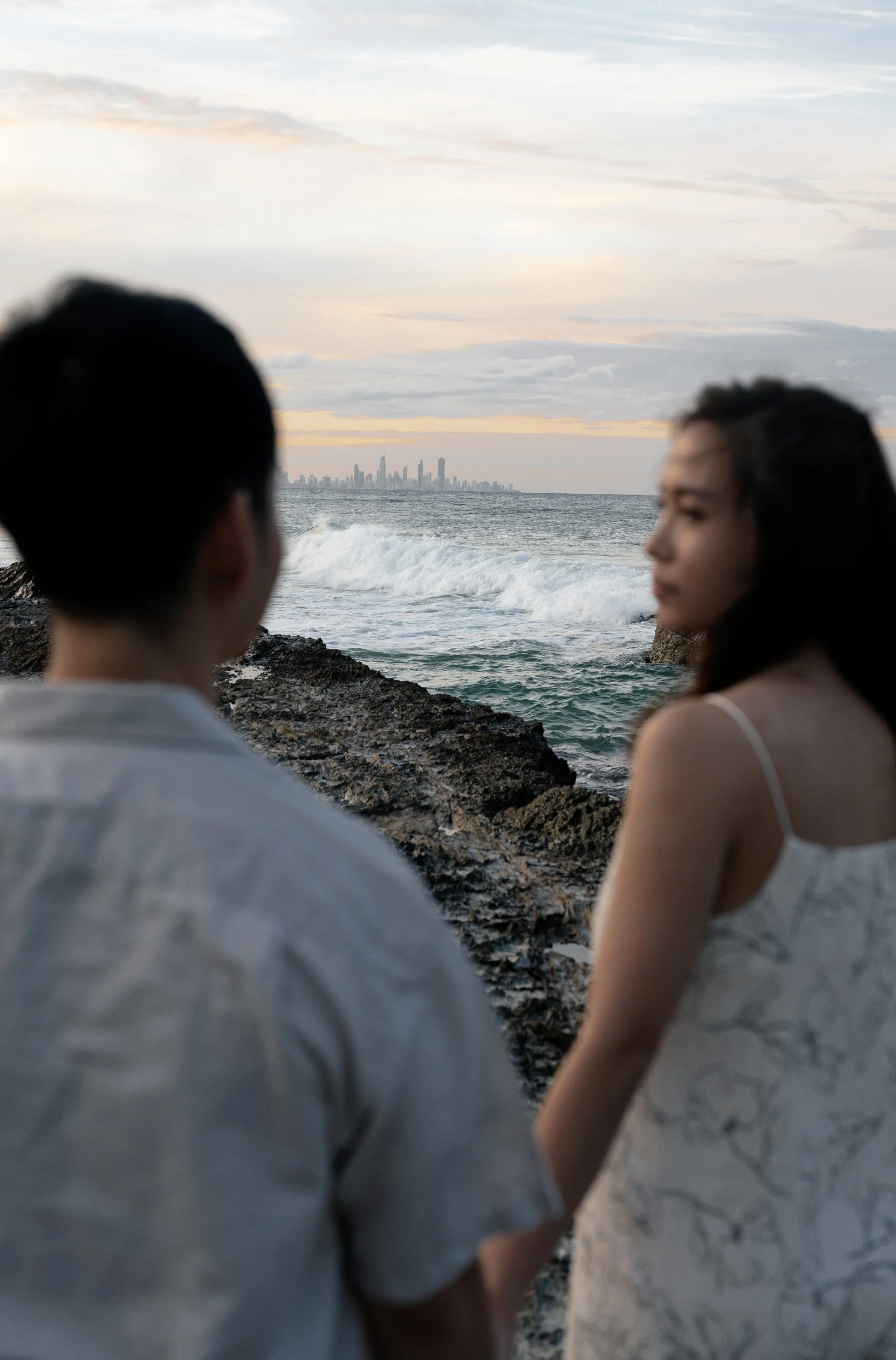 Krystel look back to Paul with Gold Coast city view in background