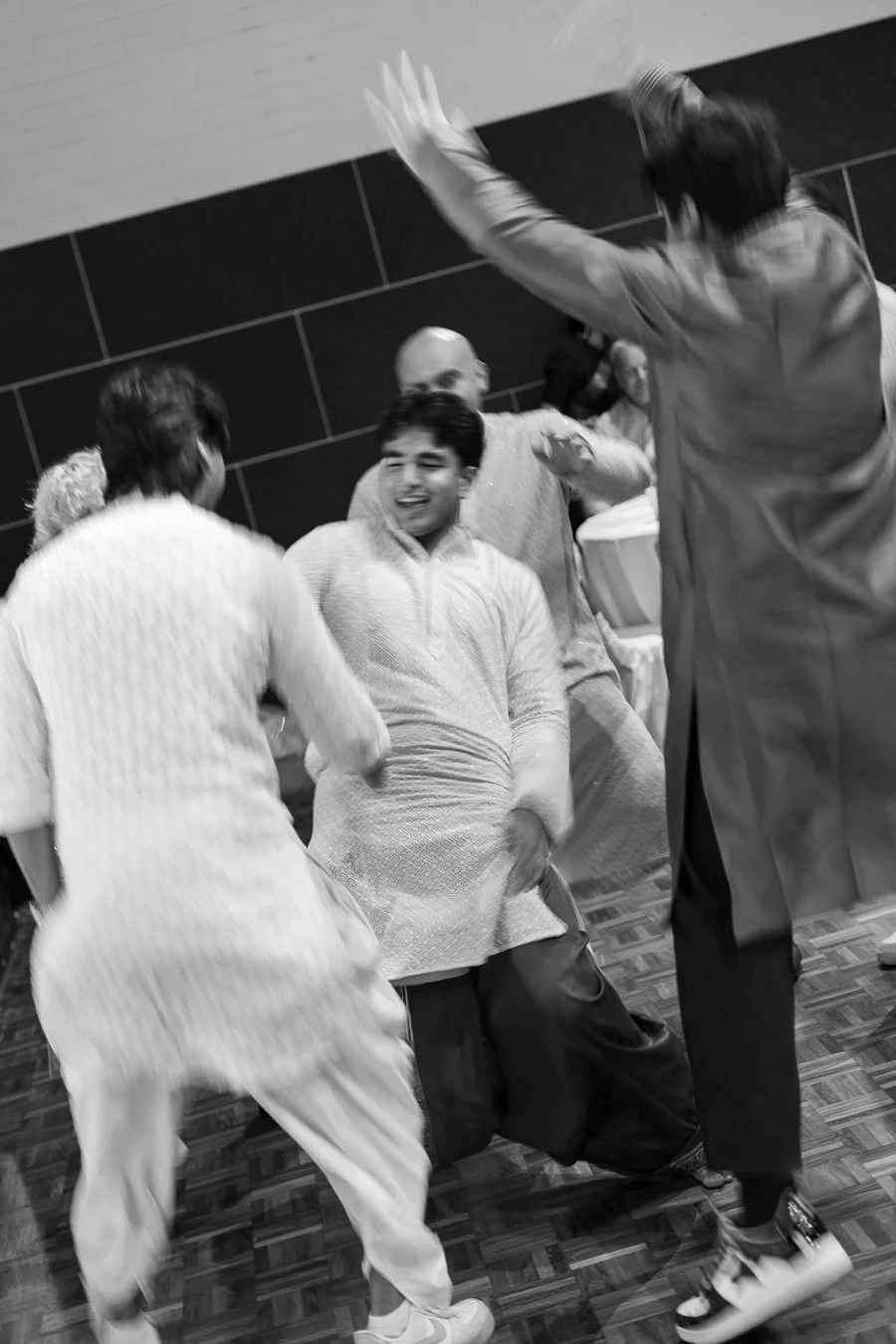 Amrita's brother dancing in the mid of 4 males