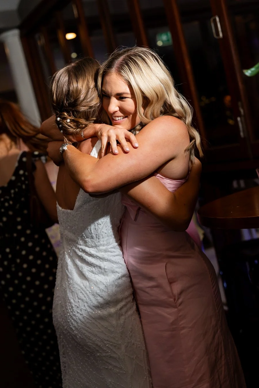 a female hugging bride Sonya