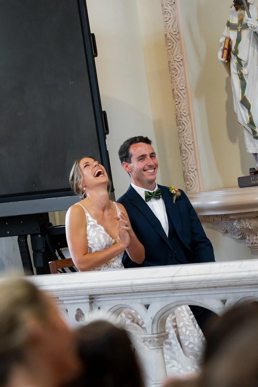 The bride laughed heartily and clapped her hands