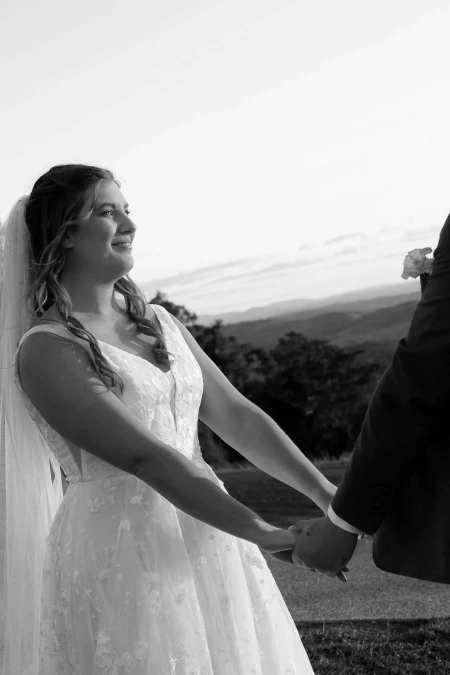 bride look to groom in smell