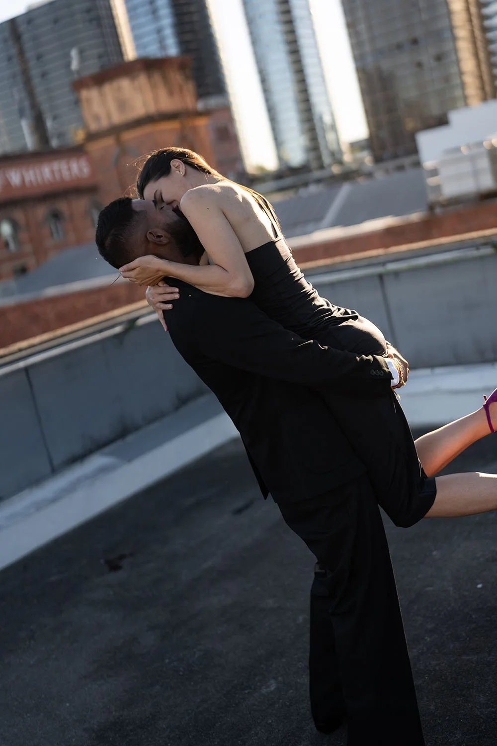 a close up for Jasmin holding Jay's neck kiss him