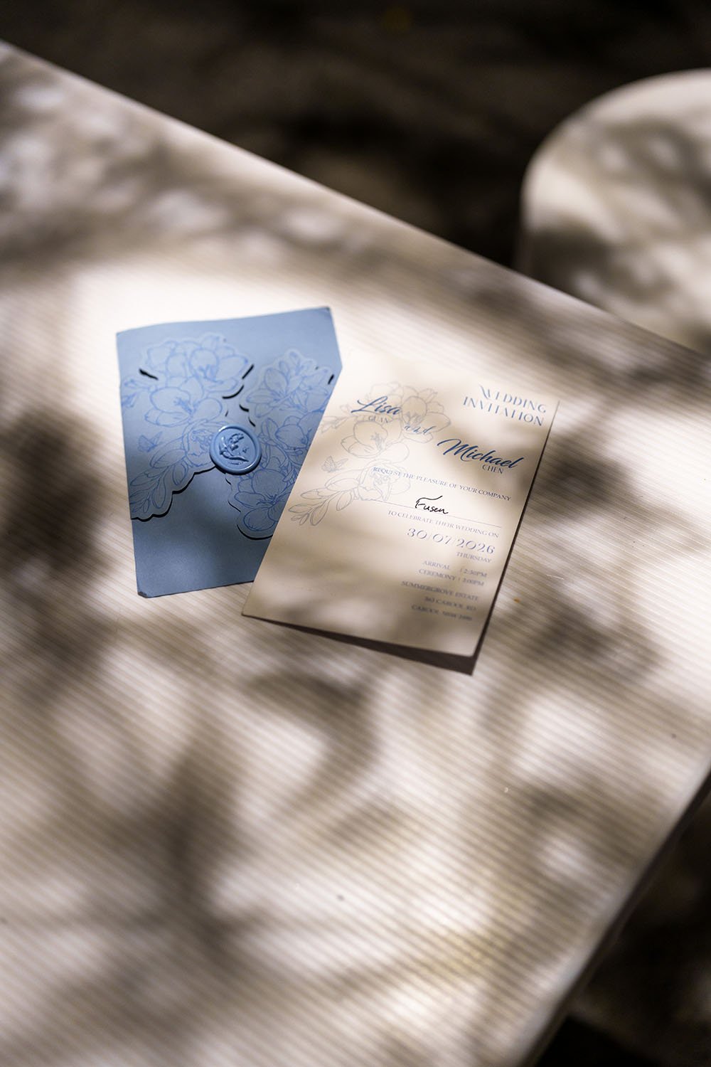 invitation card on white table