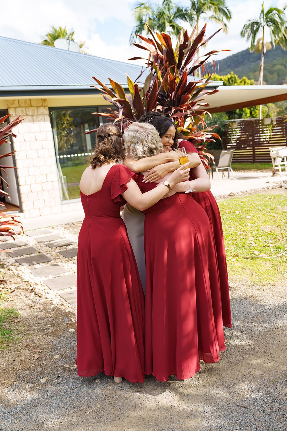 Jasmin hugging her bridesmates
