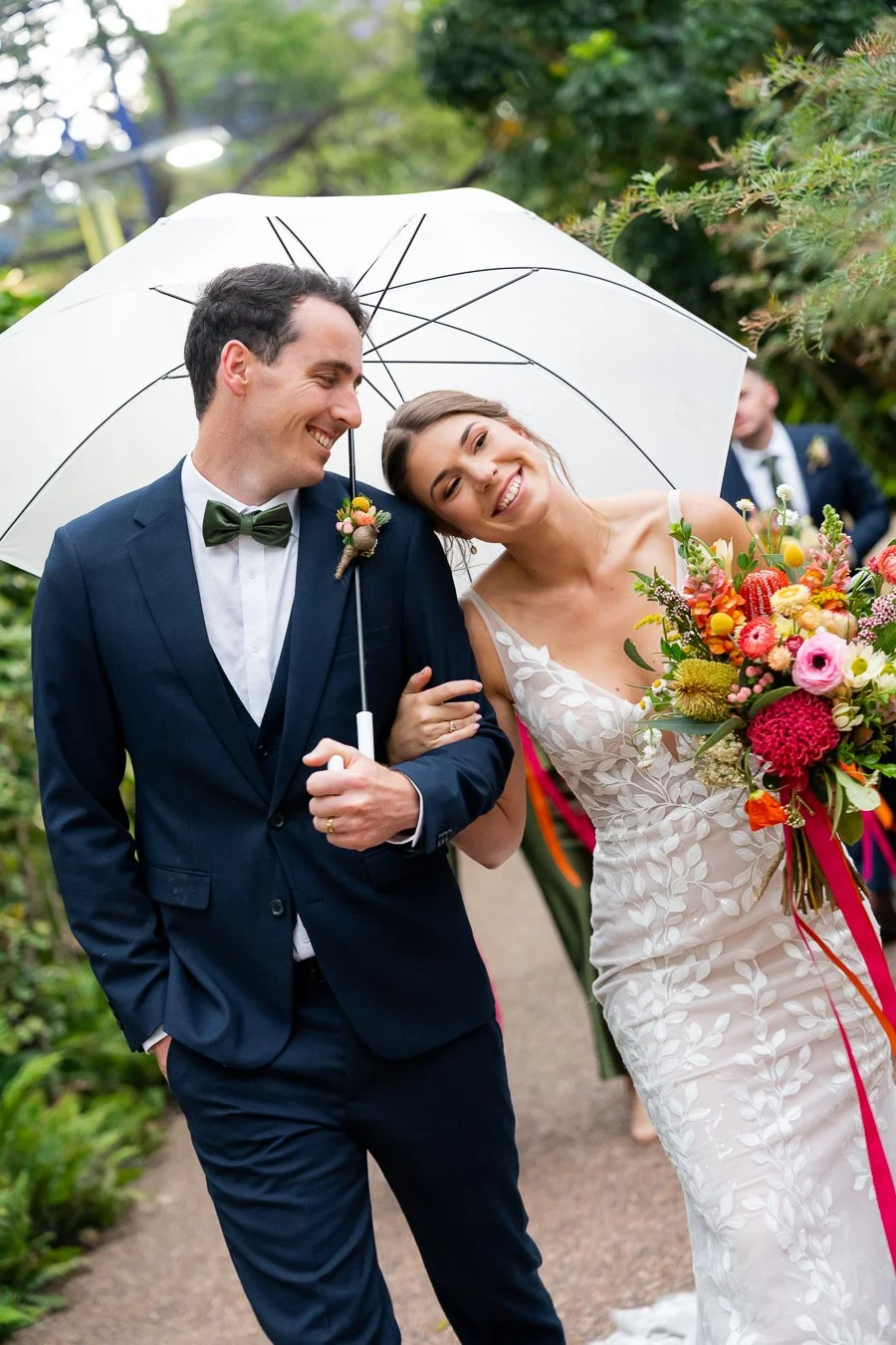 bride Sonya leaning on groom Giordan's shoulder
