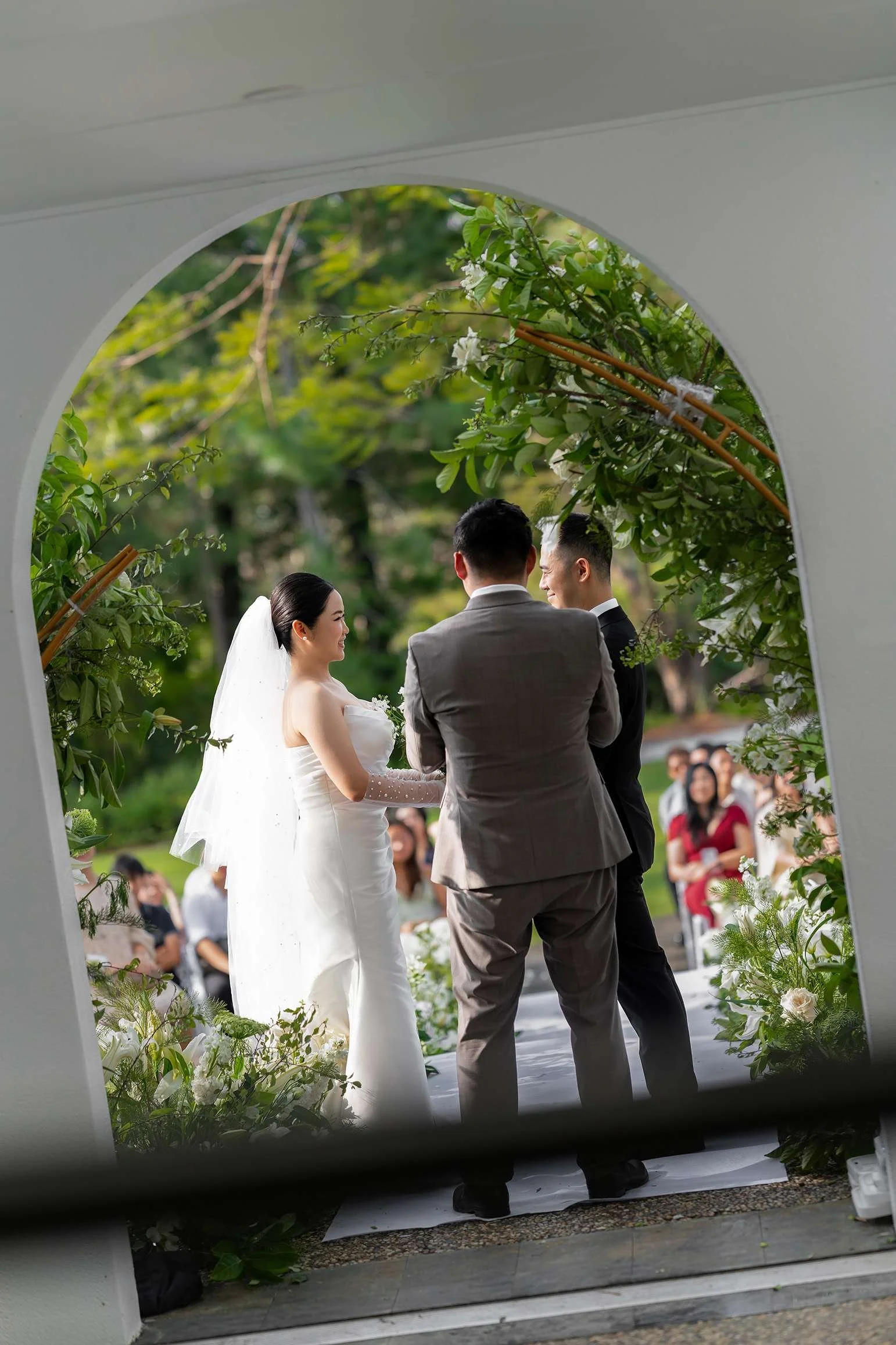 through the window to see Wendy and Alex's wedding ceremony