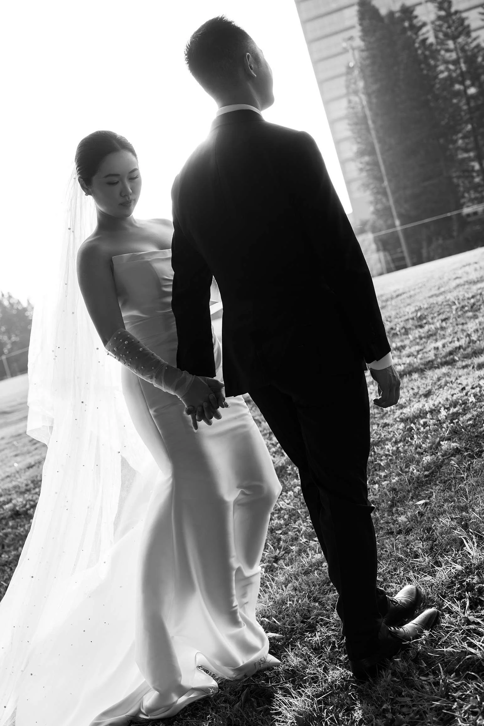 bride Wendy stand next to Alex hold his hand