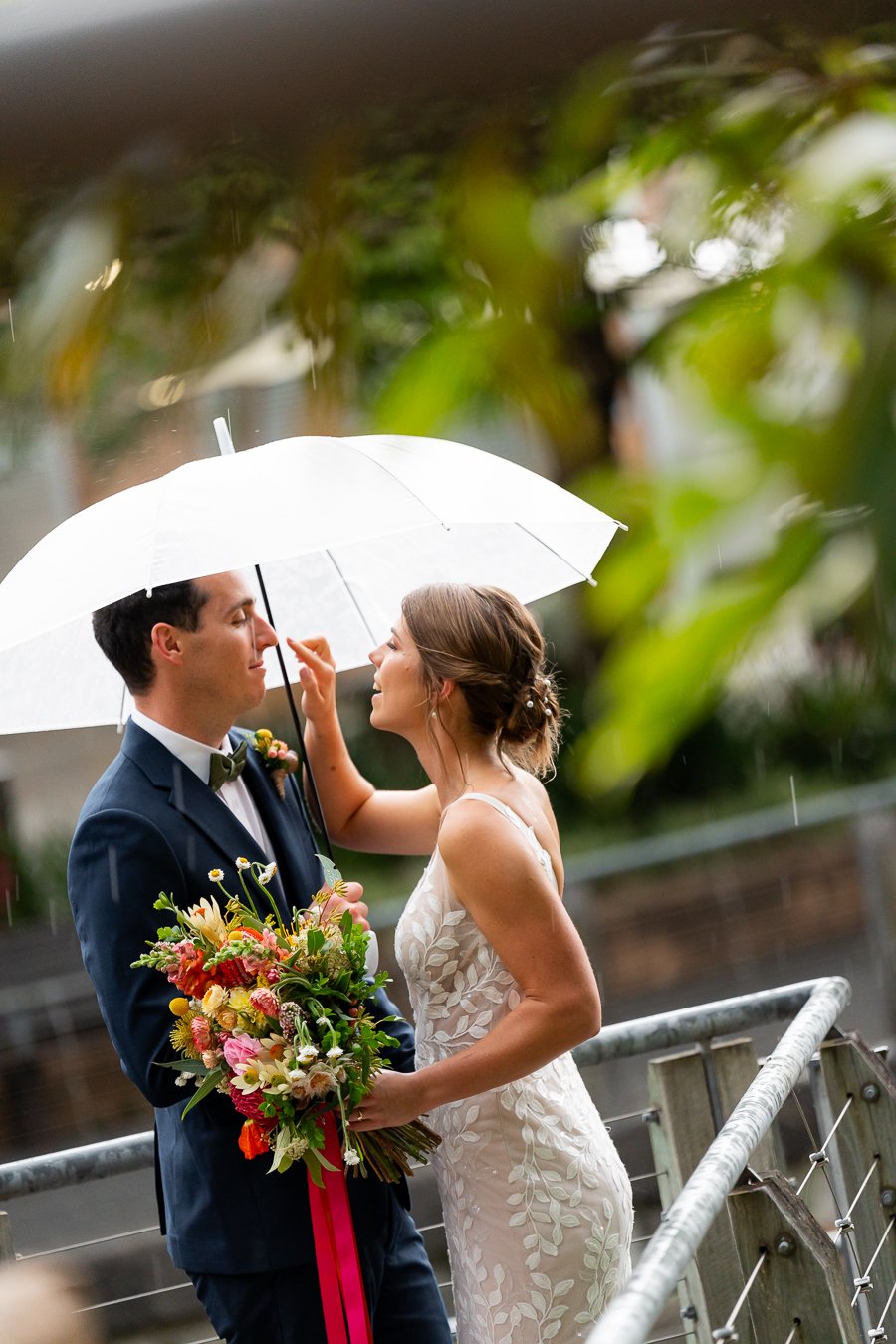 bride Sonya touching groom Giordan's nose