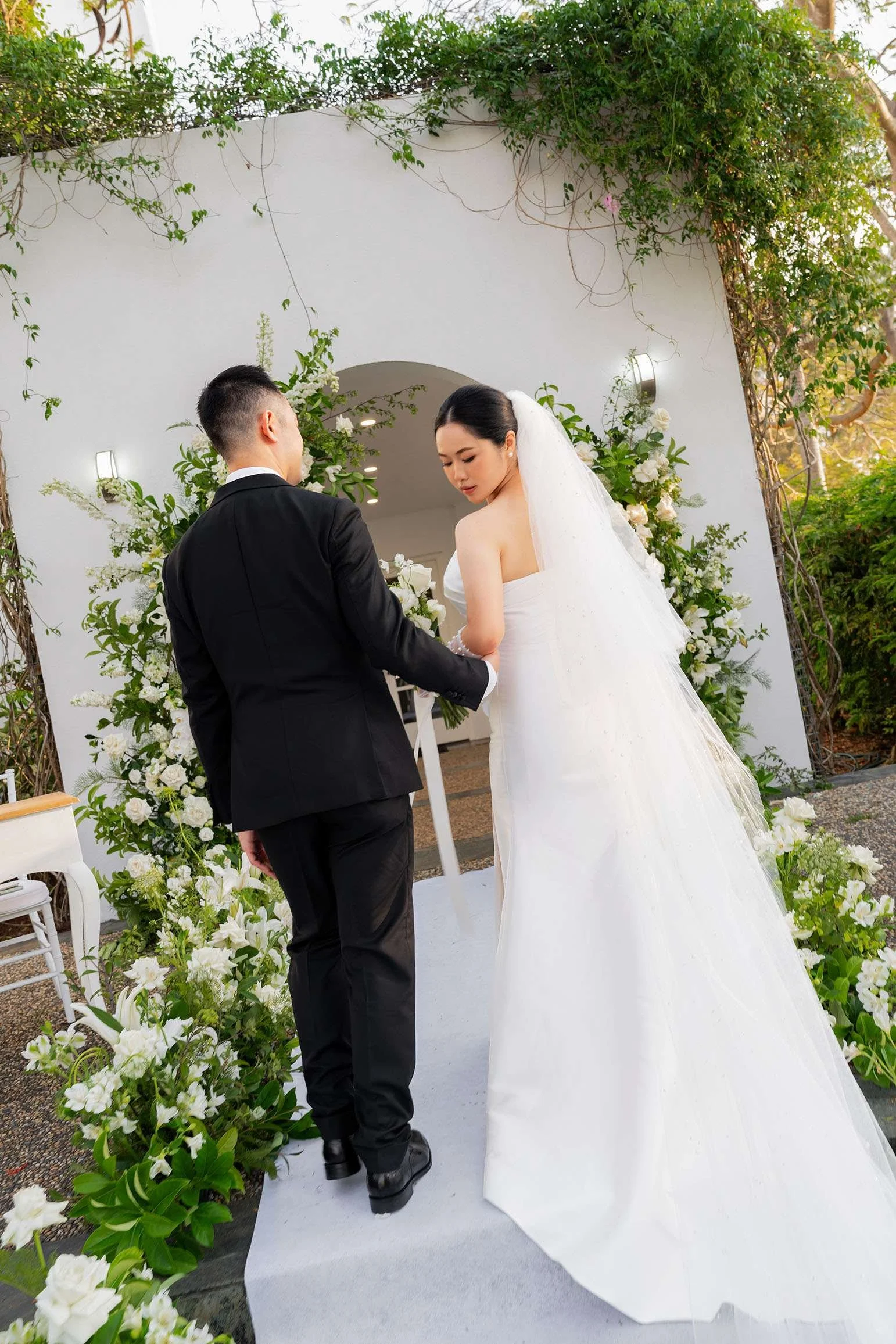bride Wendy look at her left shoulder