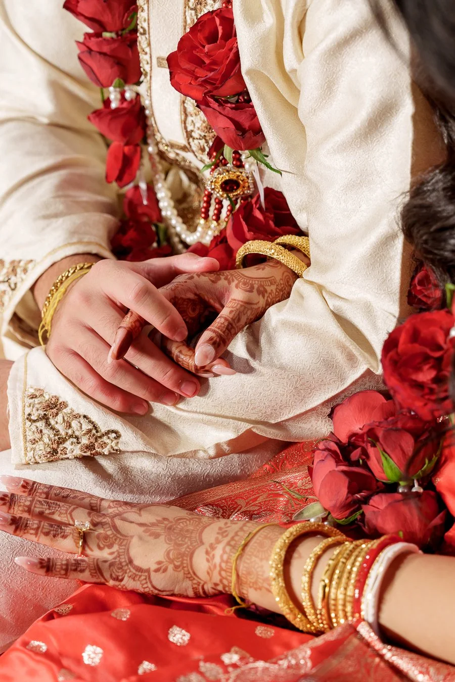 hands together Mehndi artist on Amrita's hand