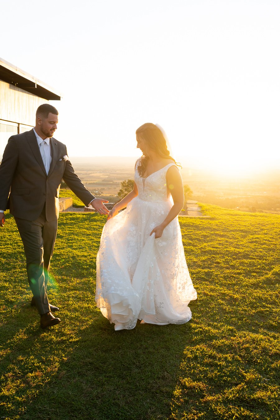 groom Ben try to holding bride Chiarra's hand