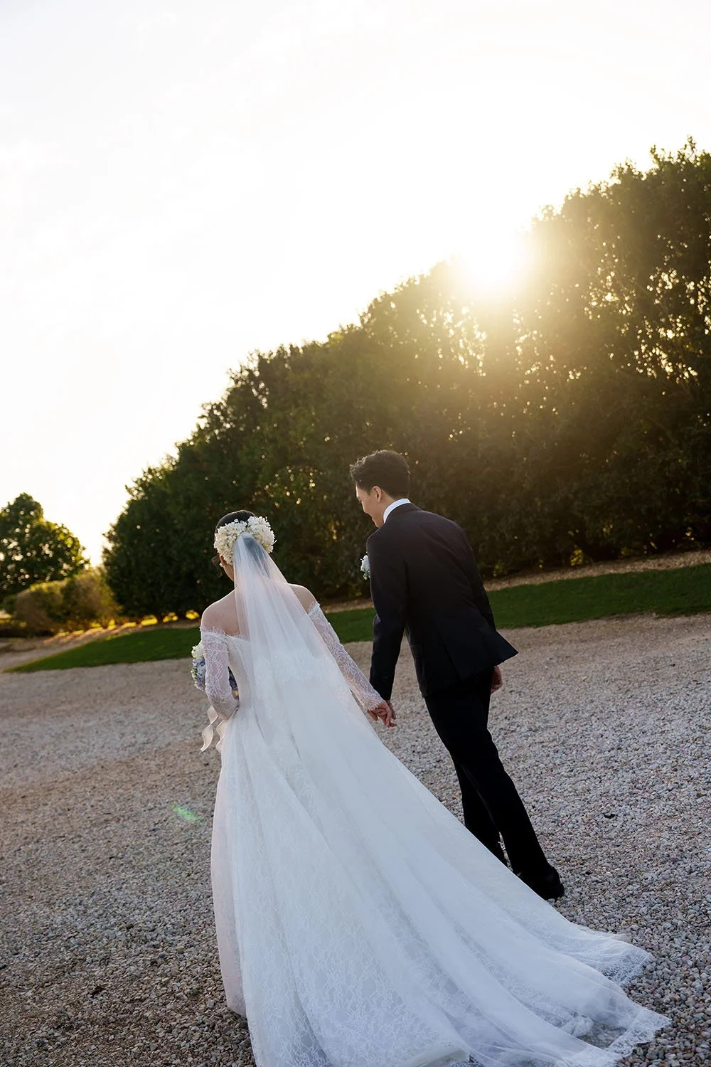 Lisa and Michael holding hands together walking away