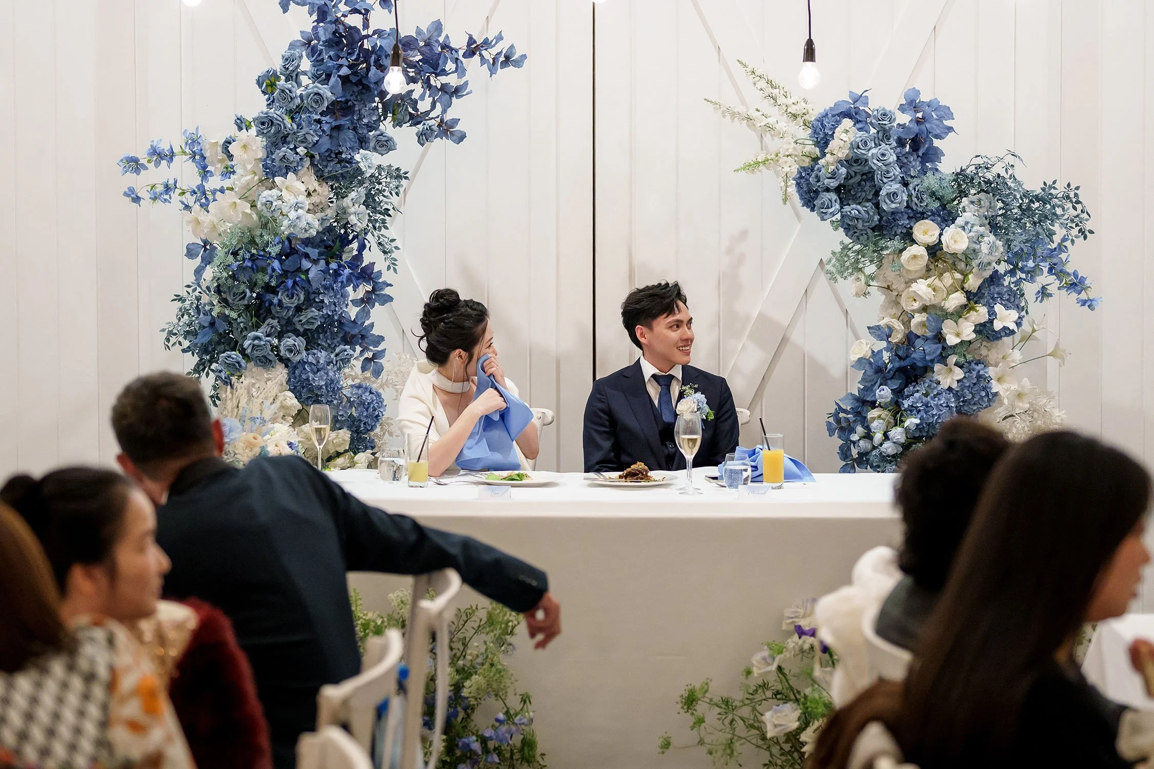 Lisa holding blue handkerchief wipe her tears and Michael laughing too