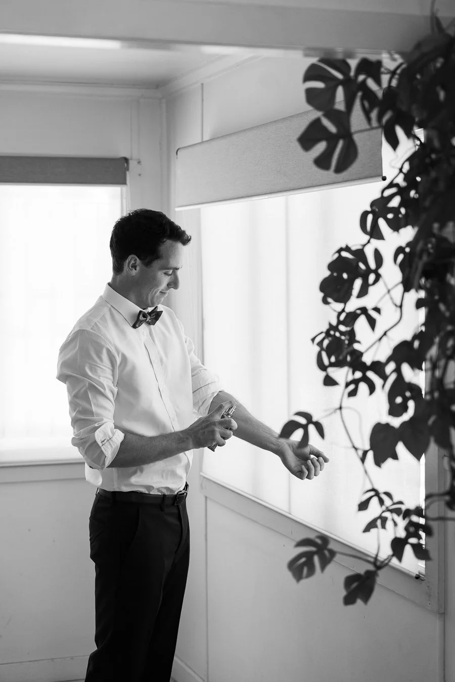 The groom sprayed cologne
