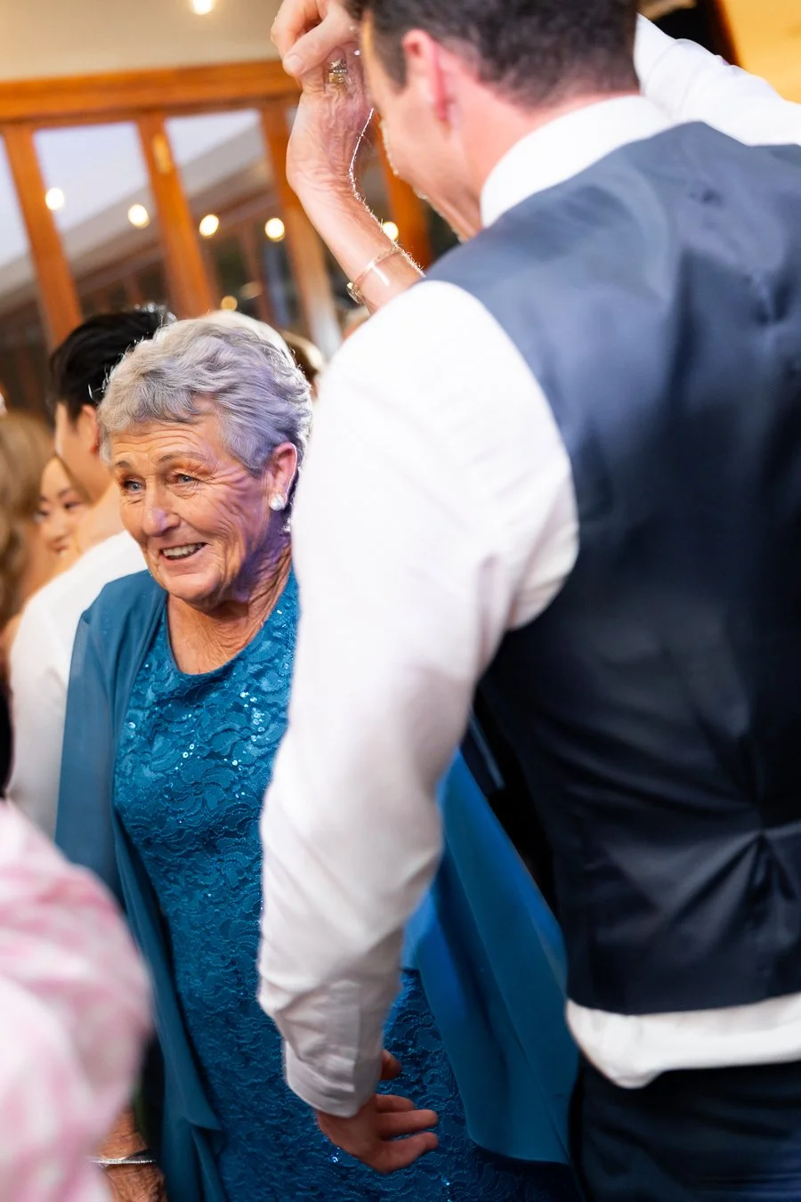 groom Giordan's grandmother dancing with him spinning