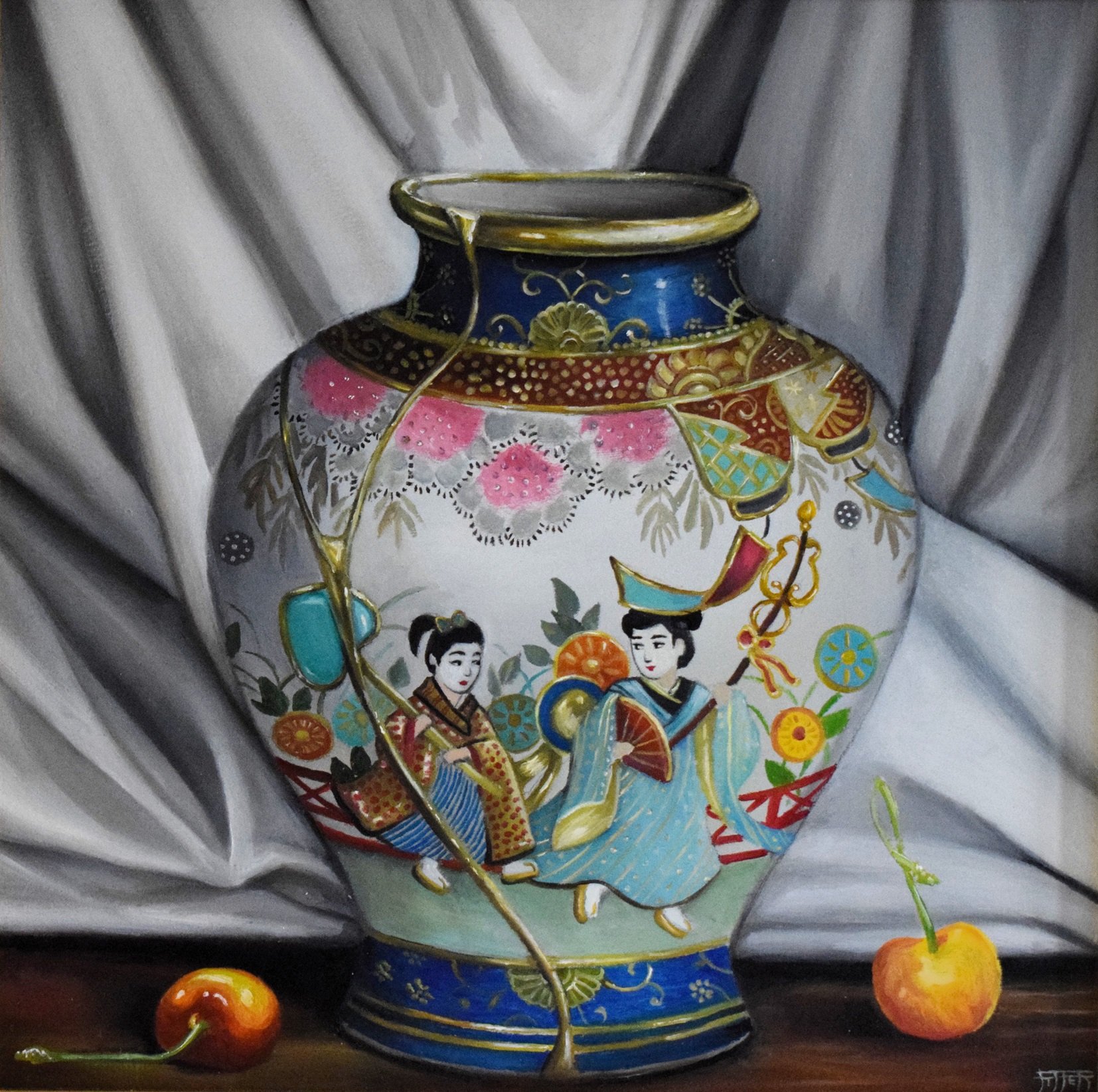 A decorative porcelain vase with colorful designs of two women in traditional Asian clothing and various patterns, set against a backdrop of white and gray fabric with cherries at the base.