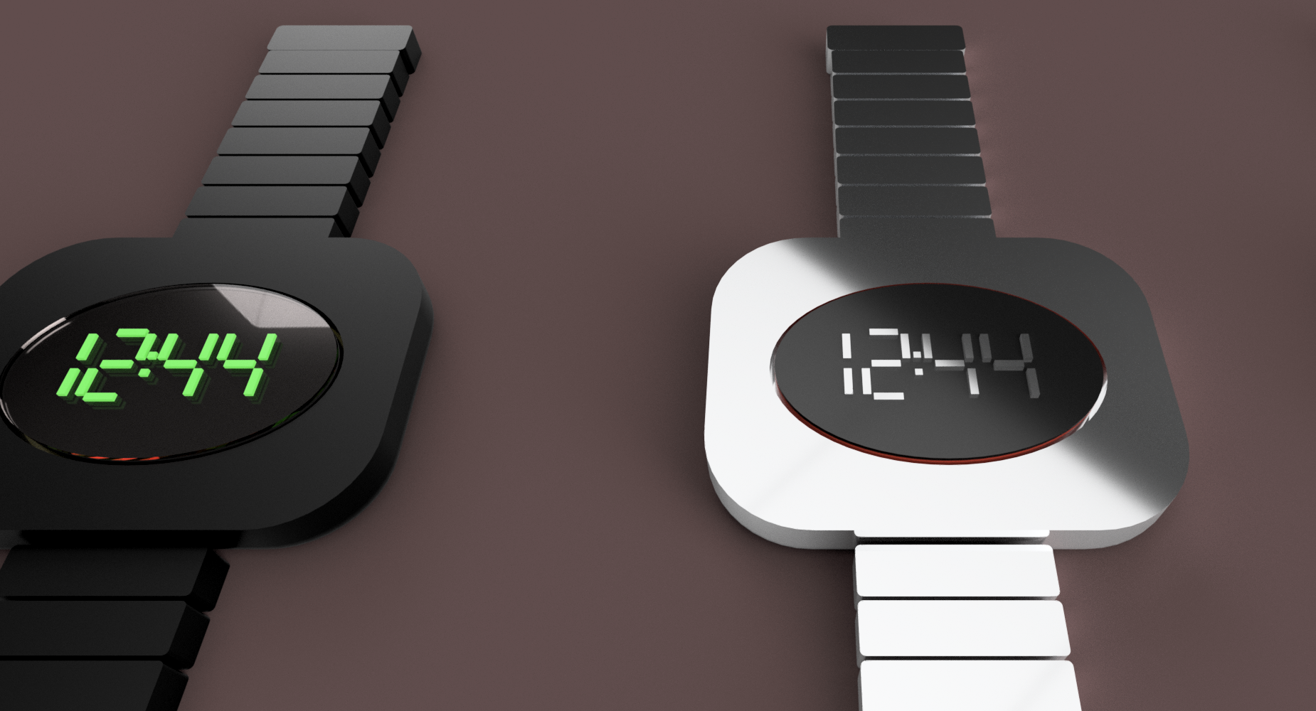 Two digital wristwatches with metal bands, one black with green display showing 12:44, and one white with white display showing 12:44, placed on a brown surface.