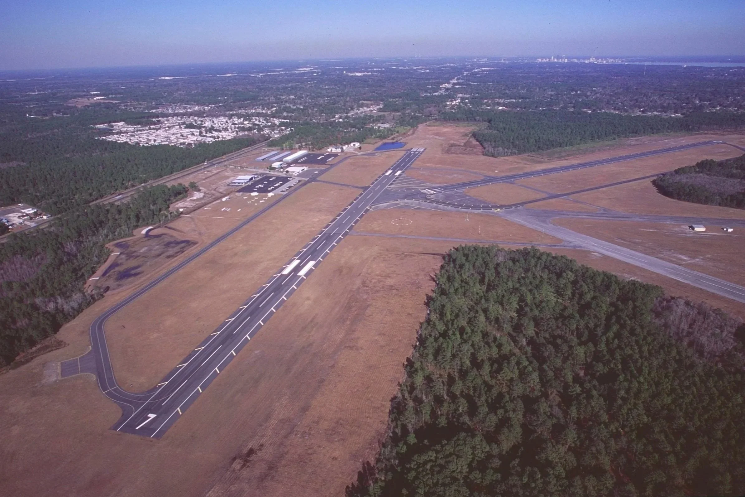 Aerial view of an Herlong Regional Airport, located in Jacksonville FL, during the day.