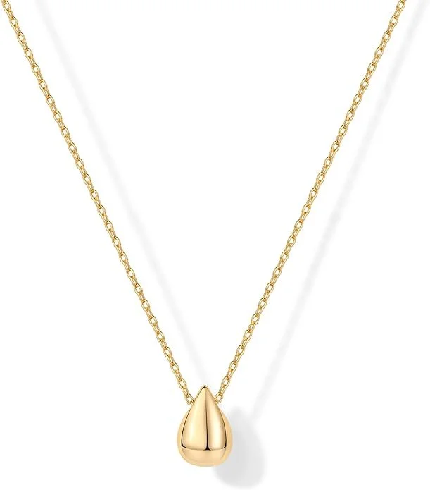 Gold necklace with teardrop-shaped pendant.