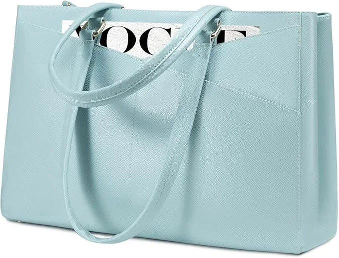 Light blue tote bag with two handles and a magazine partially visible inside.