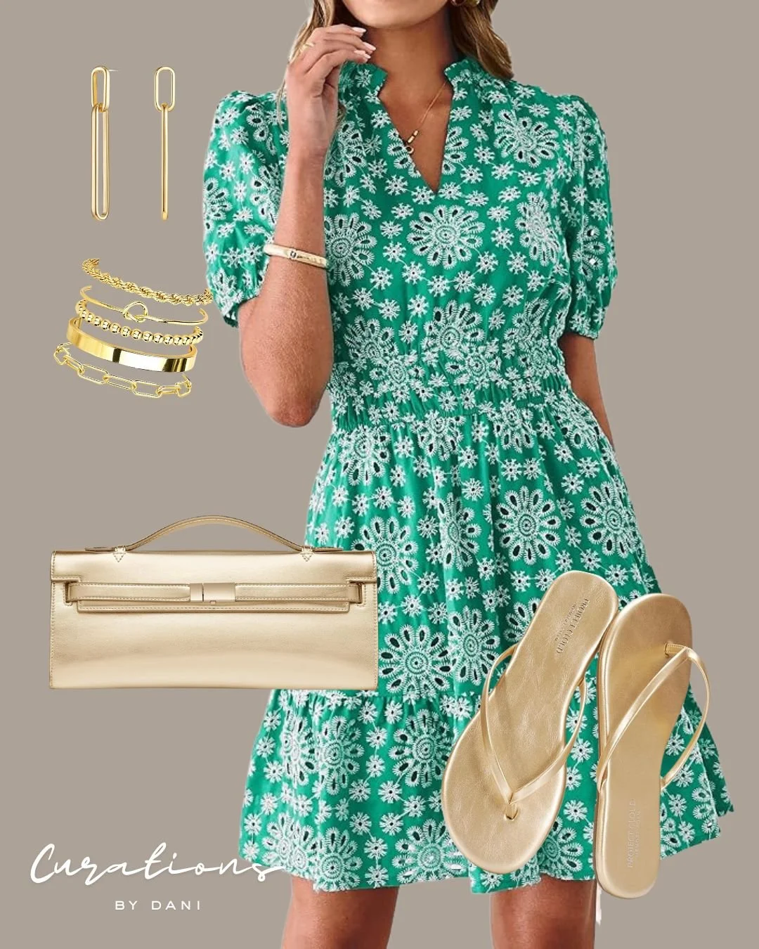 A woman wearing a green dress with white floral pattern, paired with gold heels, and accessorized with gold jewelry including earrings, bracelets, rings, and necklaces. She has a beige clutch purse.