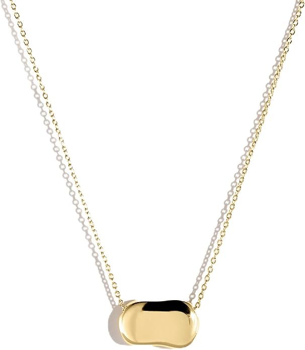 Gold and silver layered necklace with a rectangular glossy gold pendant.