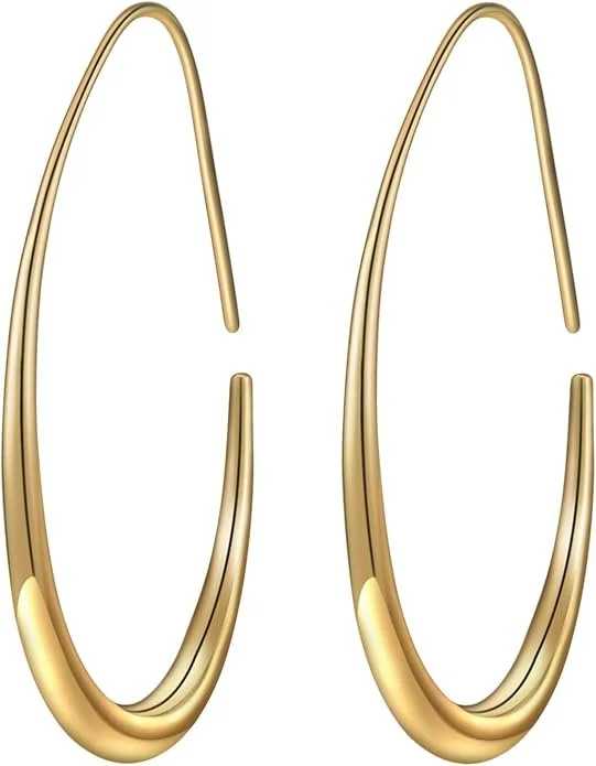 Gold hoop earrings on a white background