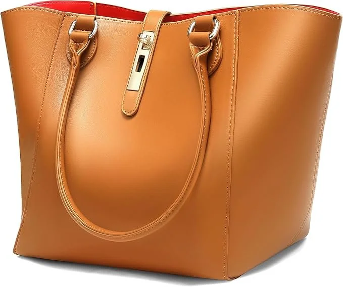 Tan leather tote bag with gold zipper and red interior lining