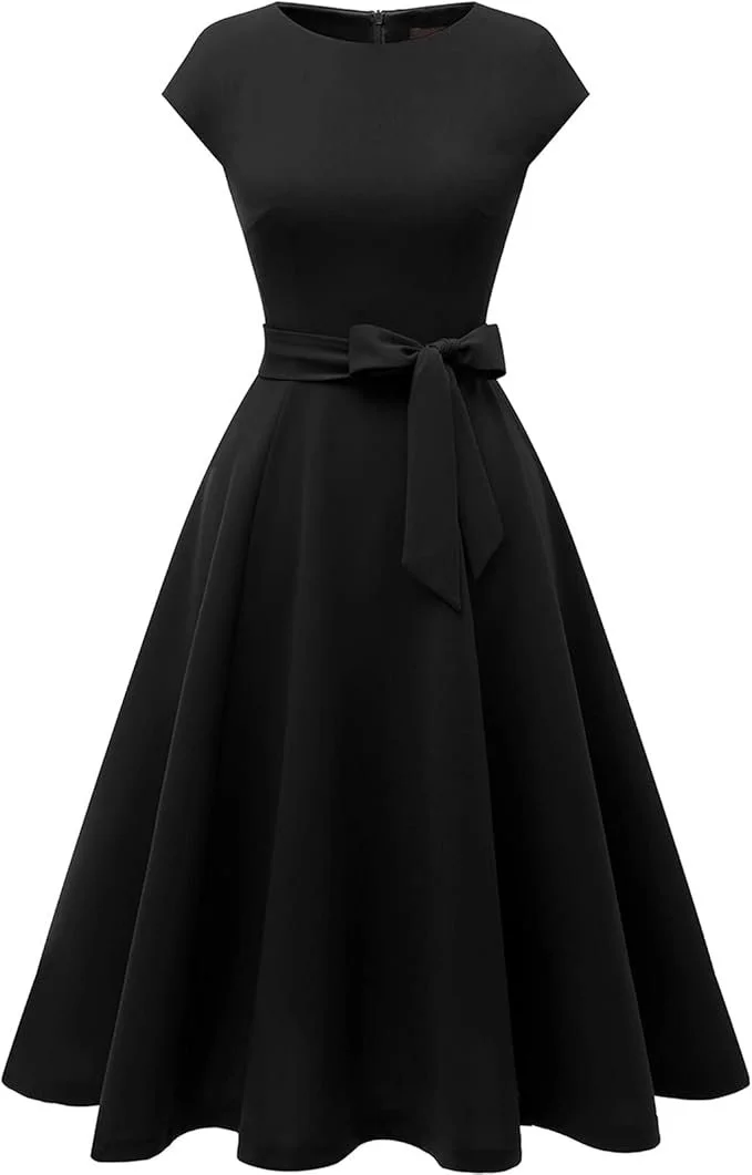 Black sleeveless dress with a fitted bodice, high neckline, and a full skirt with a waist tie bow