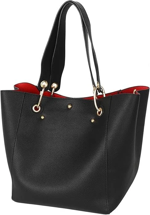 Black tote bag with gold hardware and a red interior lining.