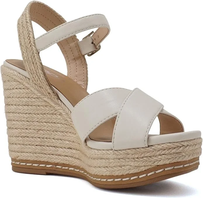 White wedge sandal with ankle strap and woven espadrille sole