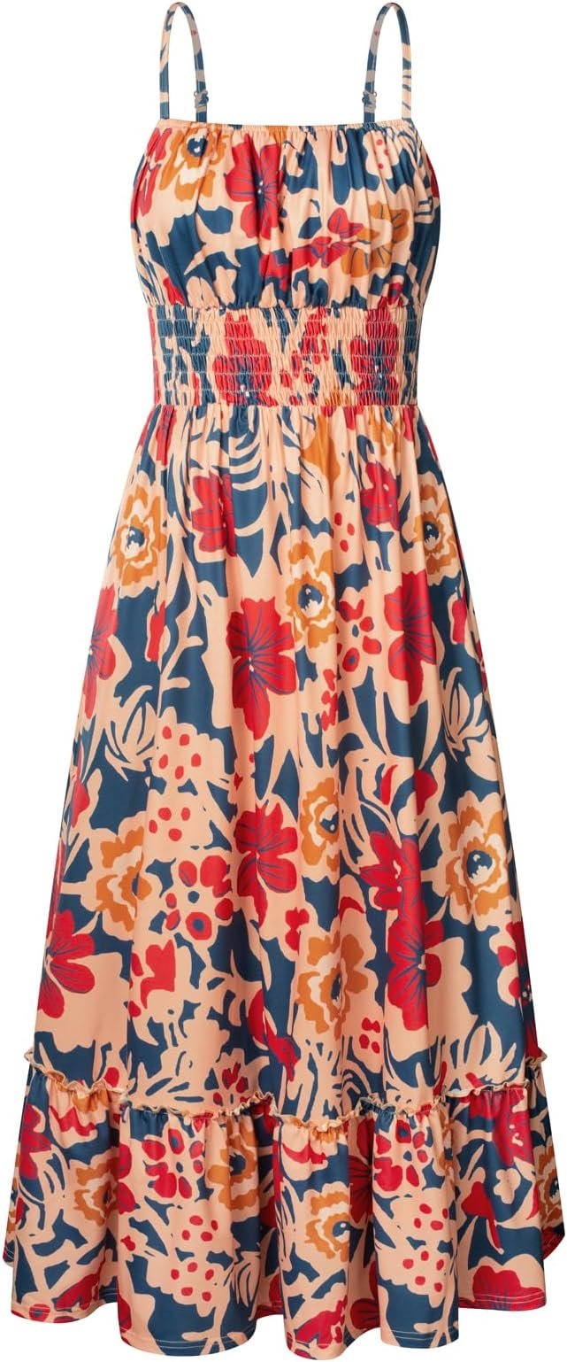 A sleeveless floral dress with spaghetti straps, featuring a colorful pattern of red, orange, yellow, and blue flowers and leaves on a light pink background.