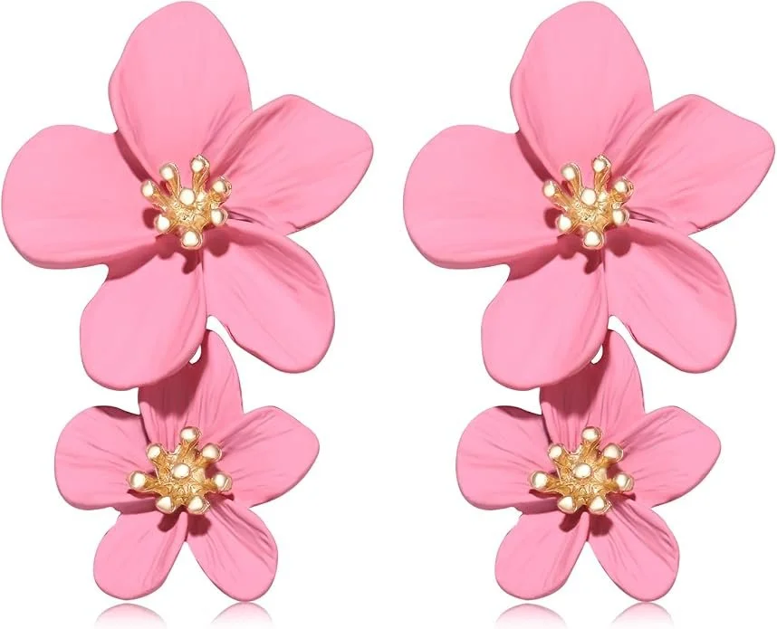 Four pink artificial flowers with gold centers, arranged in a 2x2 grid against a white background.
