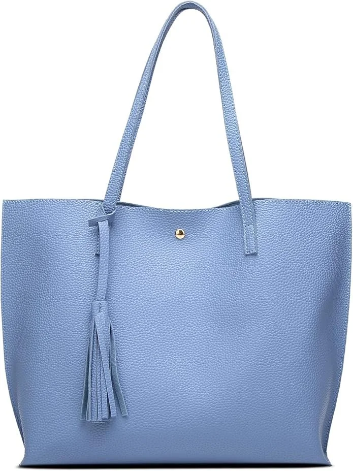 Light blue textured tote bag with two handles and a tassel detail