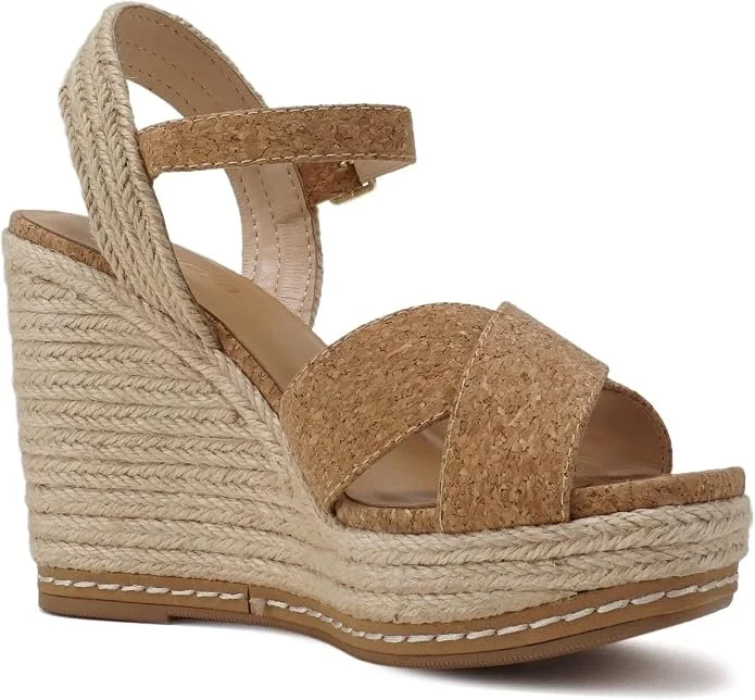 Beige and tan woven espadrille wedge sandal with ankle strap and front straps.