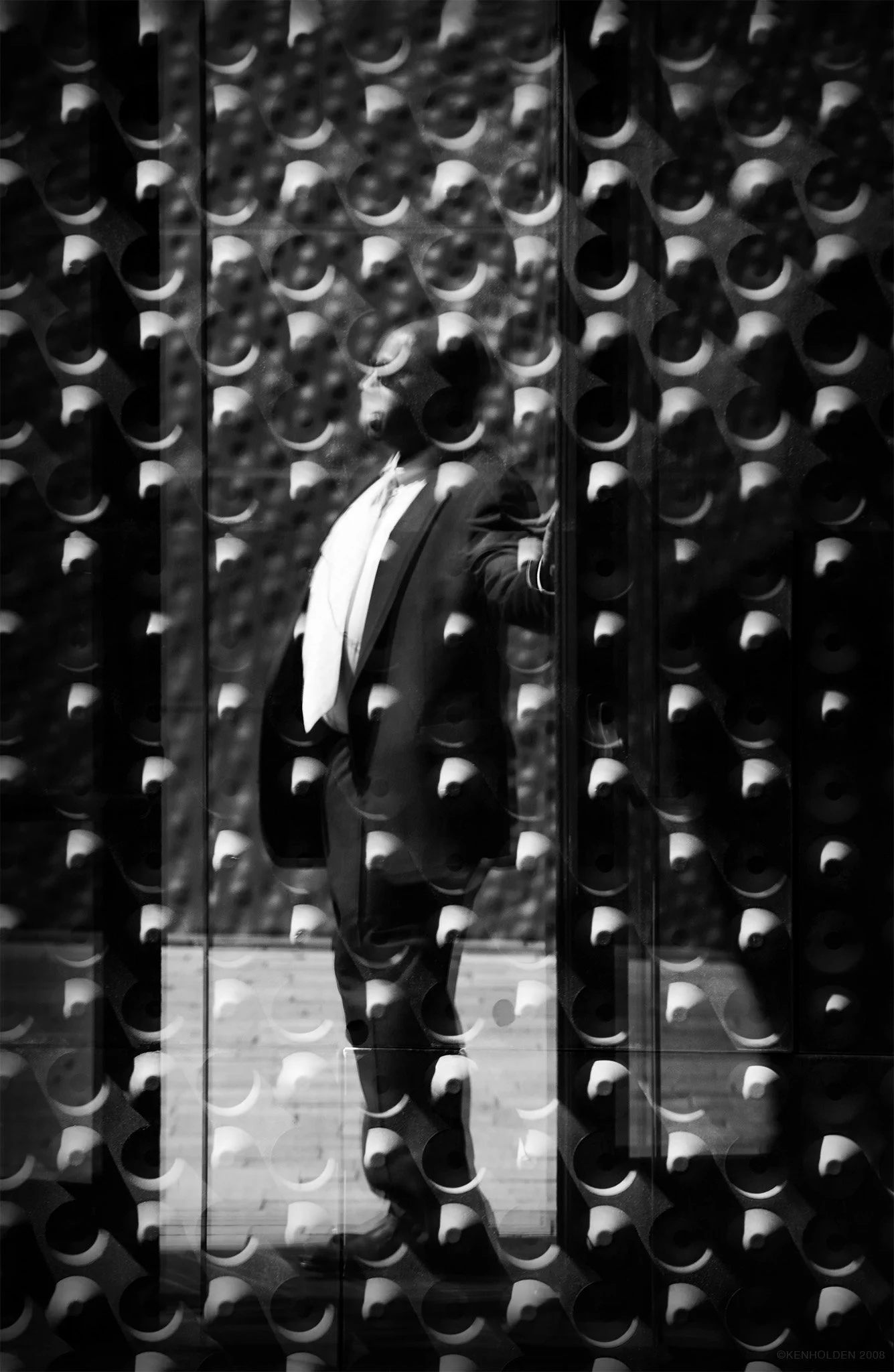 Security Guard Opening Door for Visitors, 2009