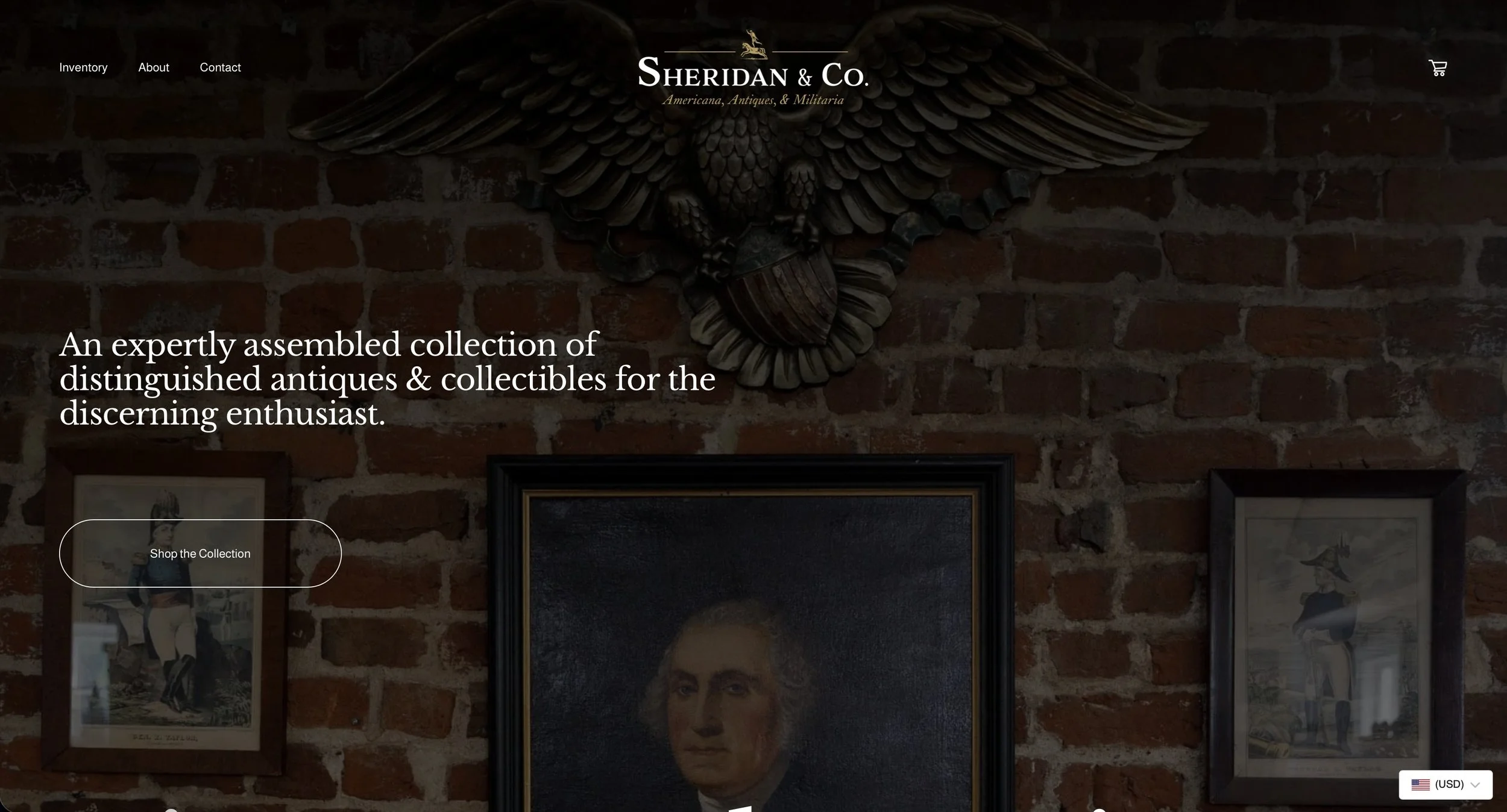 Screenshot of Sheridan & Co. website homepage featuring antique collectibles, with a decorative sculpture of an eagle with outstretched wings mounted on a brick wall, and framed art pieces below.