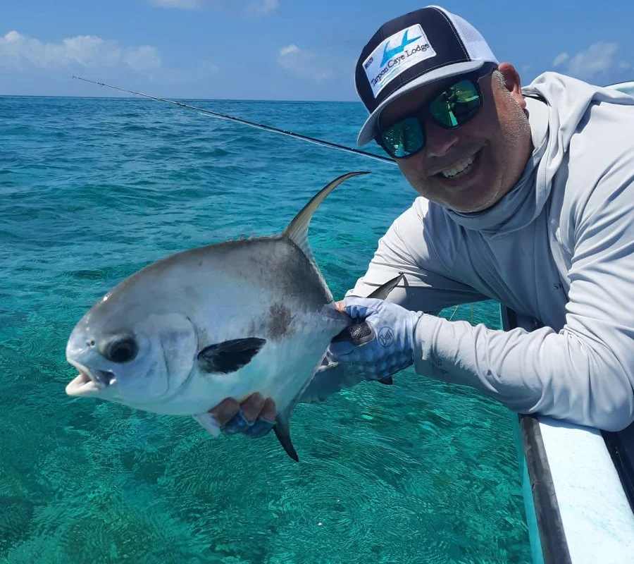 Fly fishing for permit in Belize at Tarpon Caye Lodge.