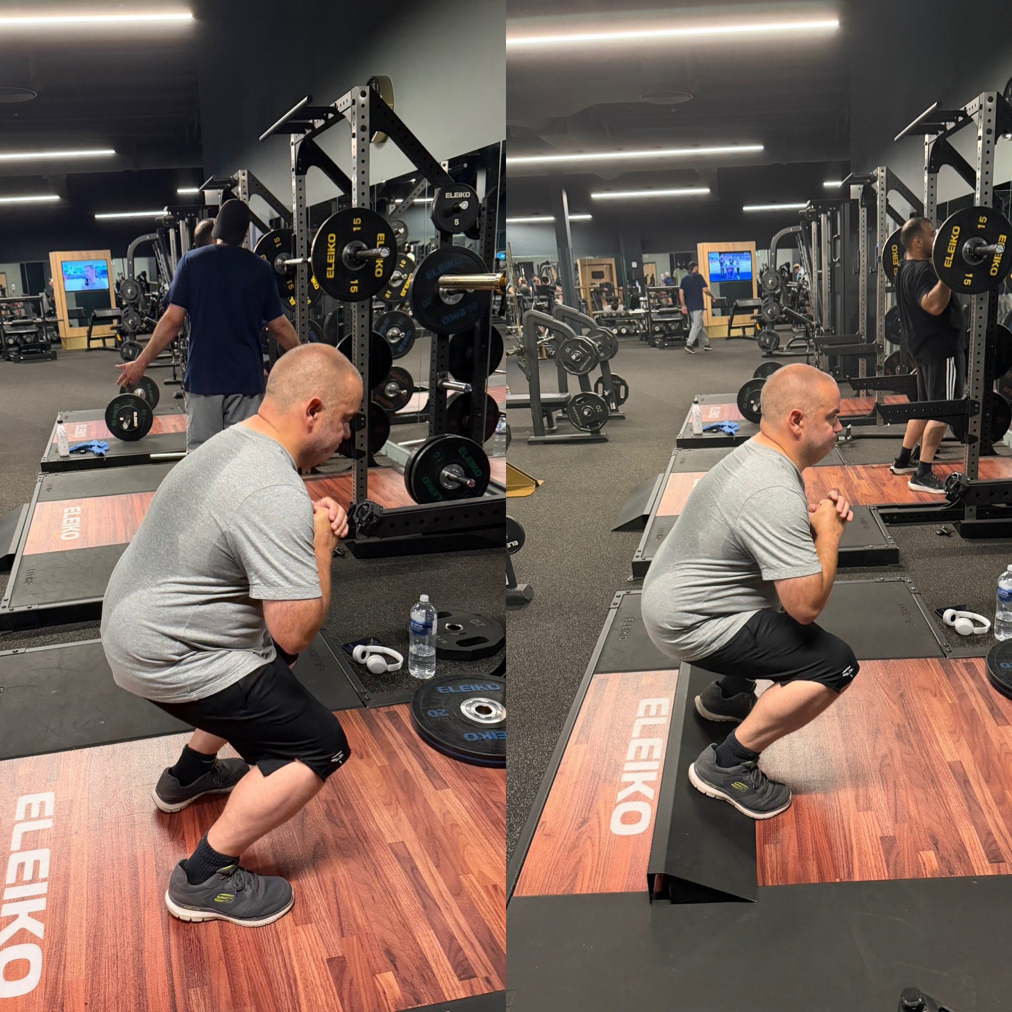 People workout at the gym with weightlifting equipment, doing exercises like deadlifts, on workout mats near gym mirrors and a television screen. The image reflects an adjustment to improve squat form.