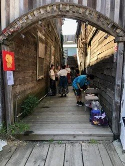 Performers preparing for their dance on The Star Theater walkway, Spring Festival 2026.