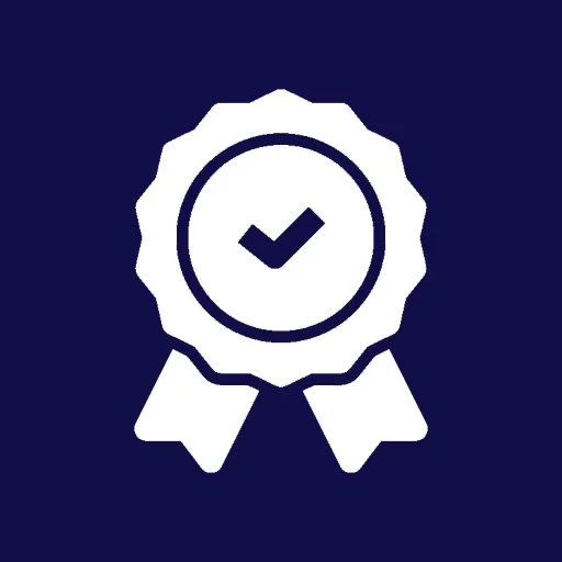 Icon of a badge with a checkmark in the center, representing certification or approval.