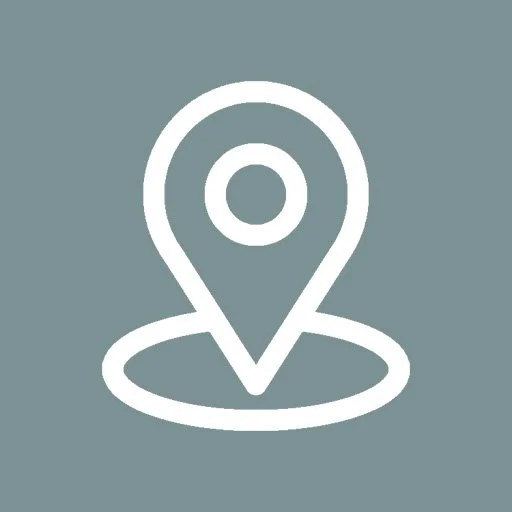 Icon of a map pin on a gray background.