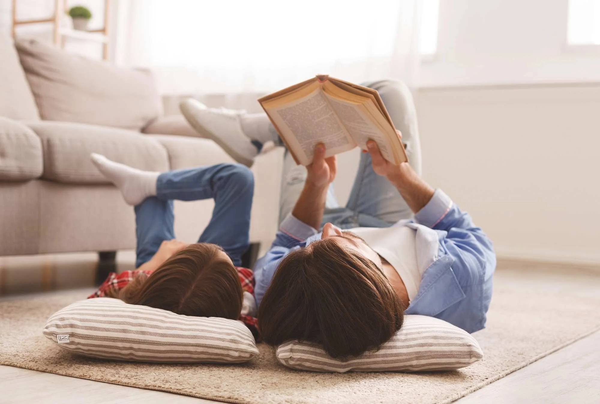Parent reading to child on the floor parent resources child psychology dr ivana di leo